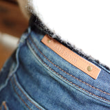 Jeans with strap