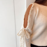 Open shoulder lace pull