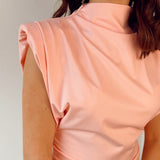 Pink top with shoulderpads