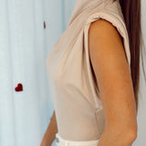 Beige top with shoulderpads