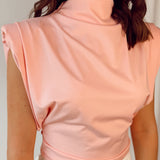 Pink top with shoulderpads