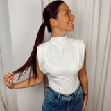 White top with shoulderpads