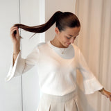 Pull with pearl sleeves