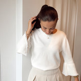 Pull with pearl sleeves