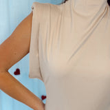Beige top with shoulderpads