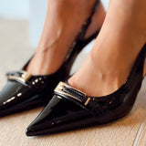 Black heels with golden detail